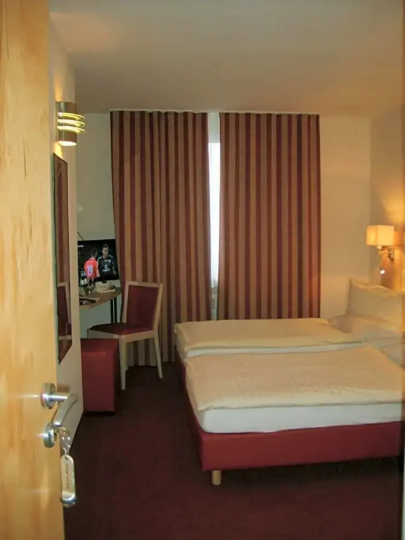 City Hotel by Celina - Chambres