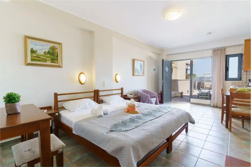 Sunrise Suites - Chambres