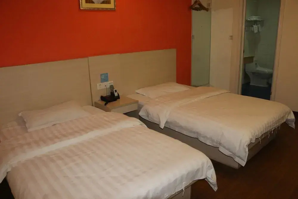 Yixin Business Hotel - Chambres
