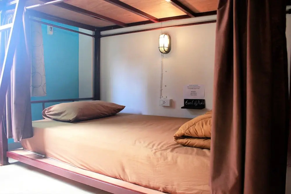 Кровать в общем номере в CM City Hostel