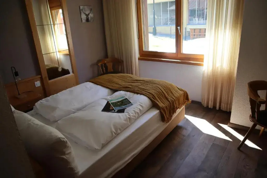 Grichting Hotel & Serviced Apartments - Chambres