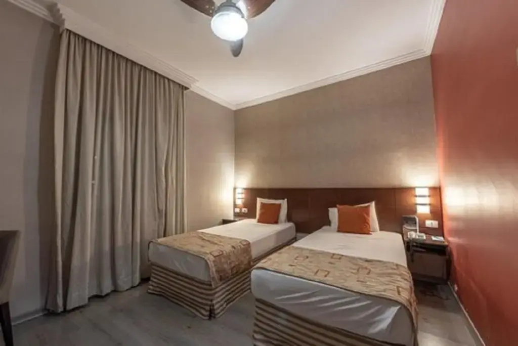 Class Hotel Guaxupé - Chambres