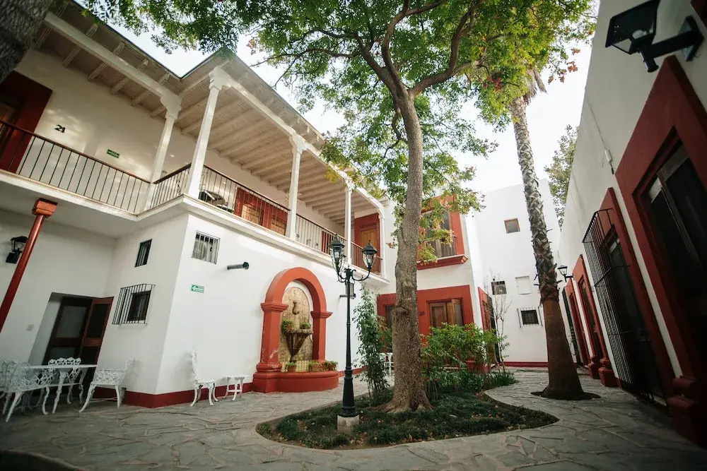 Hotel Hostal El Farol - Chambres