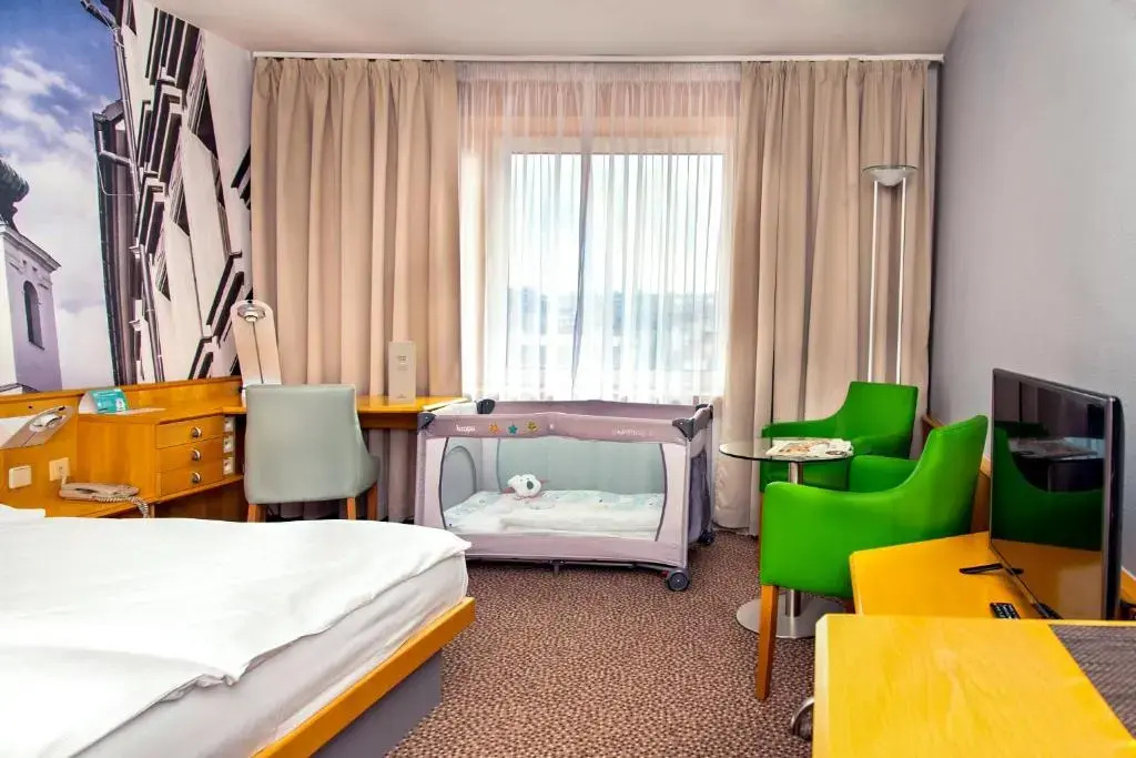 Cosmopolitan Bobycentrum - Chambres