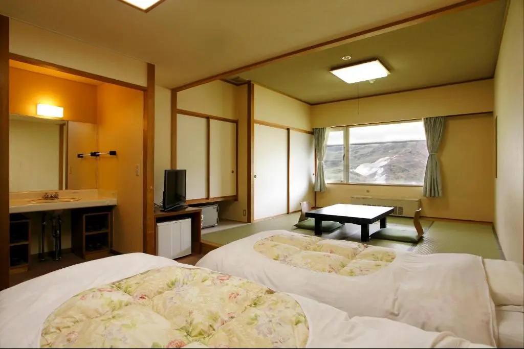 Manza Hotel Juraku - Chambres