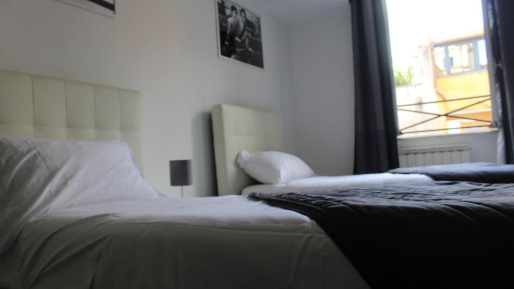 Трёхместный номер Standard в Arch Rome Suites