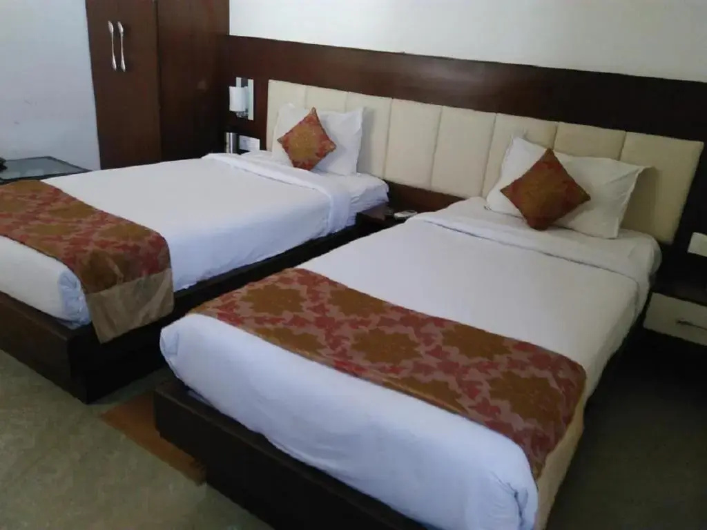 Hotel Taj Heights - Chambres
