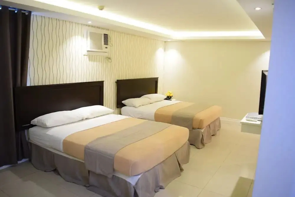Capital O 252 Euroasia Hotel - Chambres