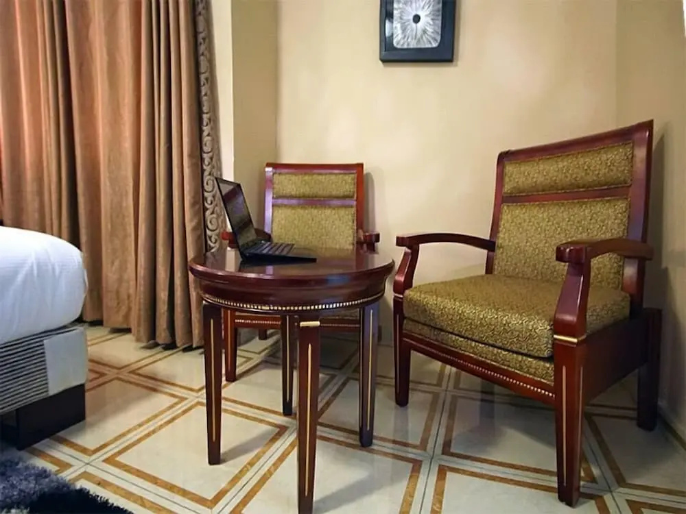 Bleu Ivy Hotel And Suites - Chambres