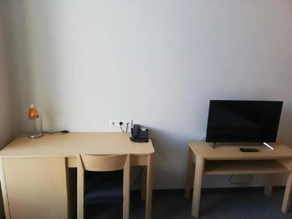 Zaliasis slenis - Self check-in hotel - Chambres