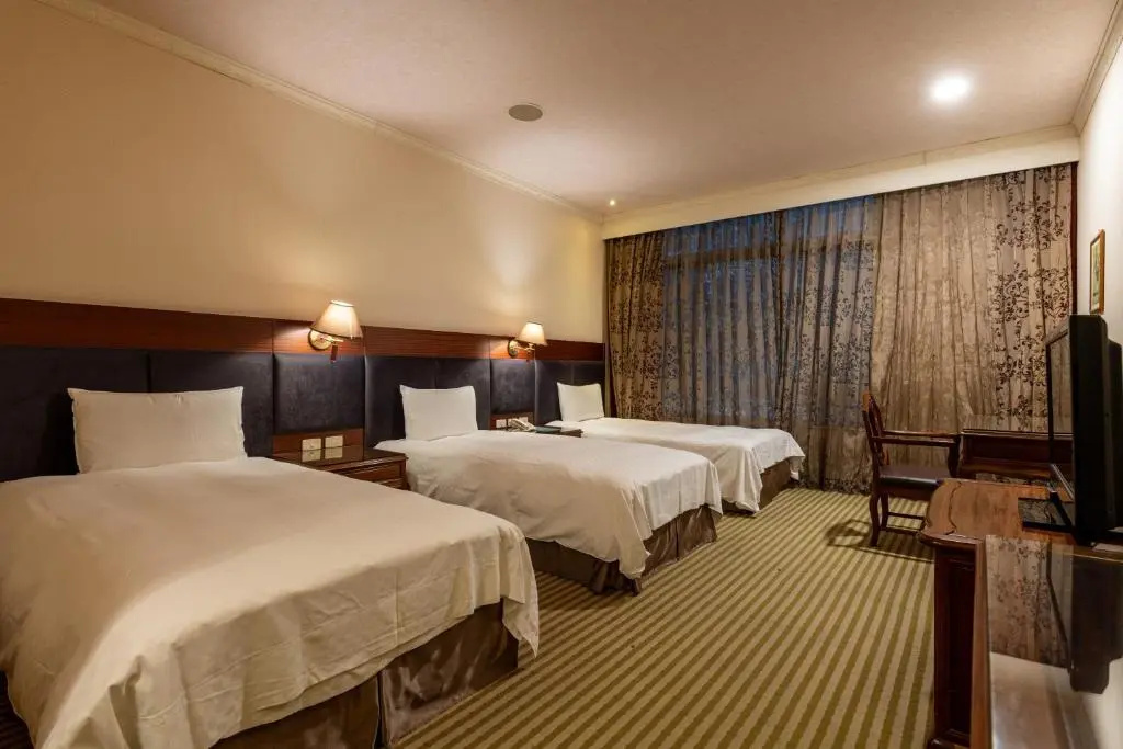 Chia Shih Pao Hotel - Chambres