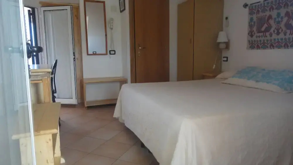 Aparthotel Domus De Janas Sul Mare - Chambres
