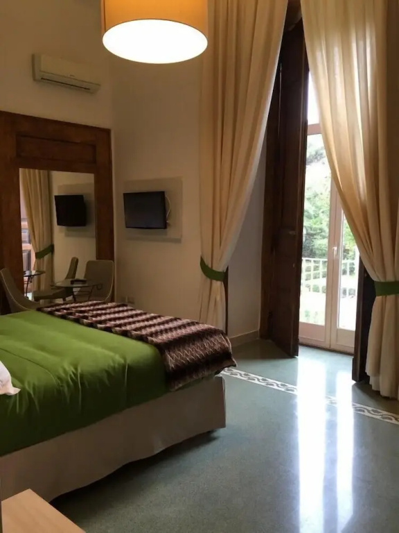 Superior Double room with balcony and with garden view (full double bed)