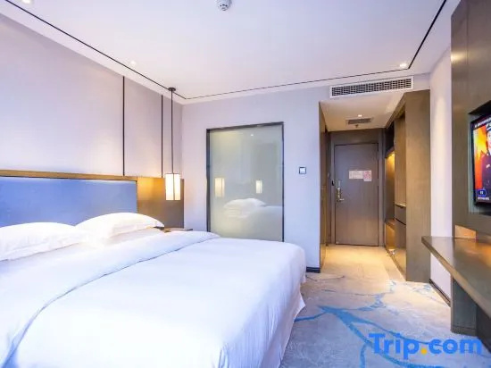 Shihe Hotel Xinyang - Chambres