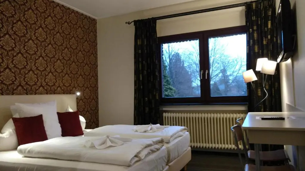 Hotel De Lange Man - Chambres