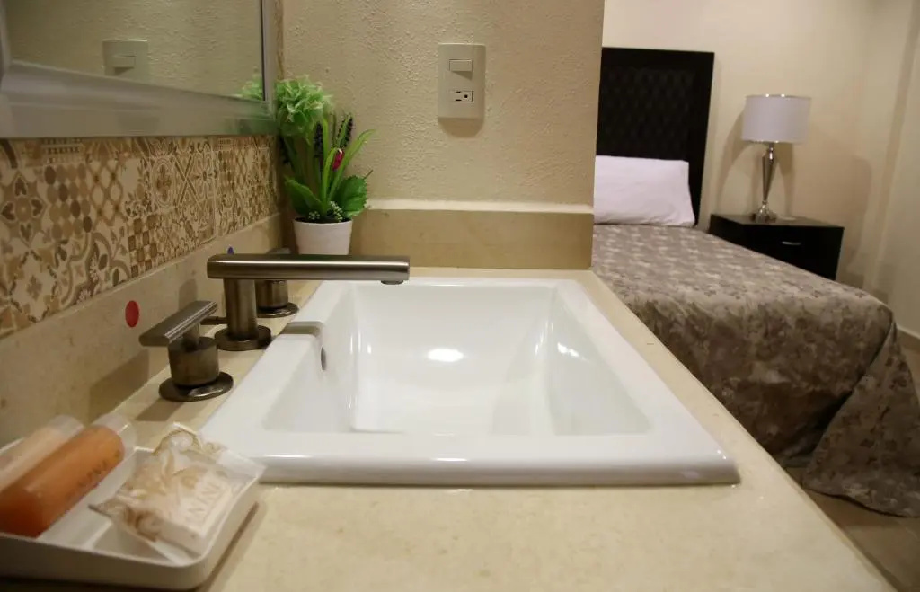 Hotel Plaza Bernal - Chambres