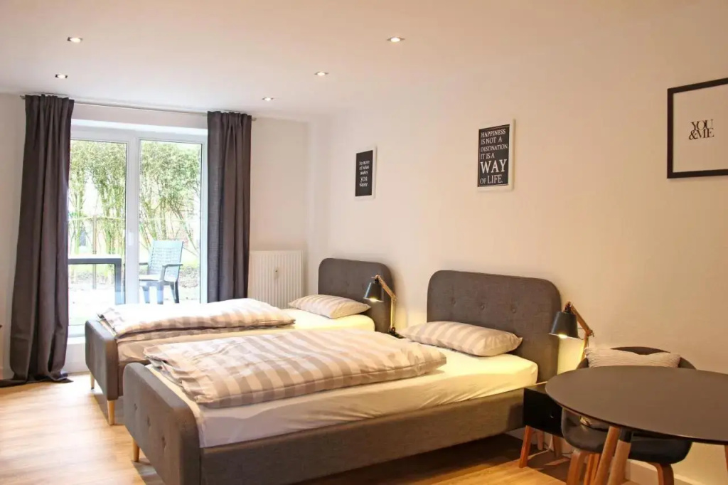Moderne 1-Zimmer Wohnung mit Terasse, Küche, Bad mit Dusche, TV & WIFI - фото 2