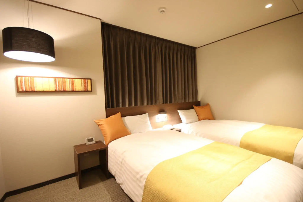 Kita Hotel - Chambres