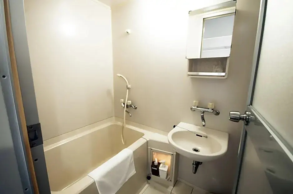 Sansui Global Inn - Chambres