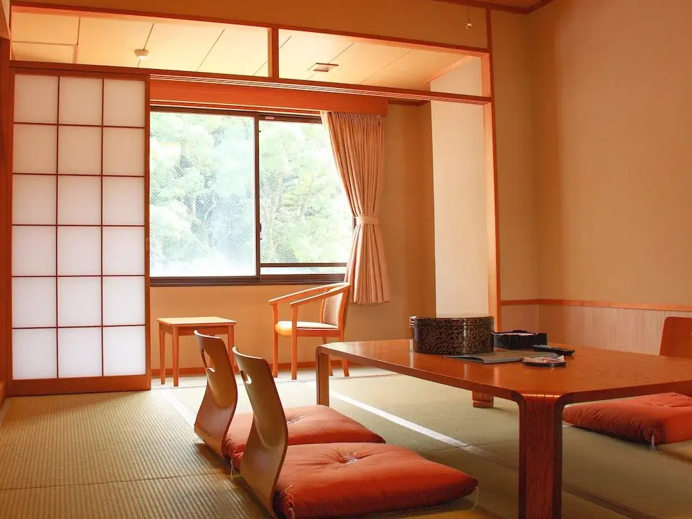 Standard Quadruple room with garden view