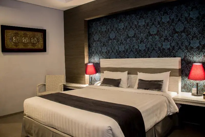 Kamini Legian Hotel - Chambres