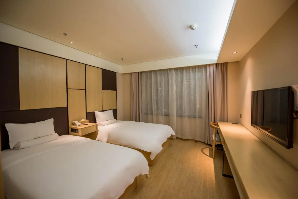 Ji Hotel Urumqi Yangzijiang Road - Chambres