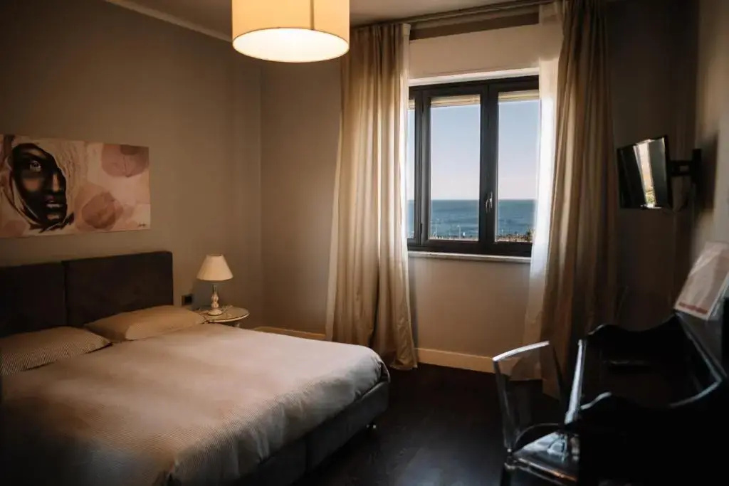 Standard Quadruple room with sea view