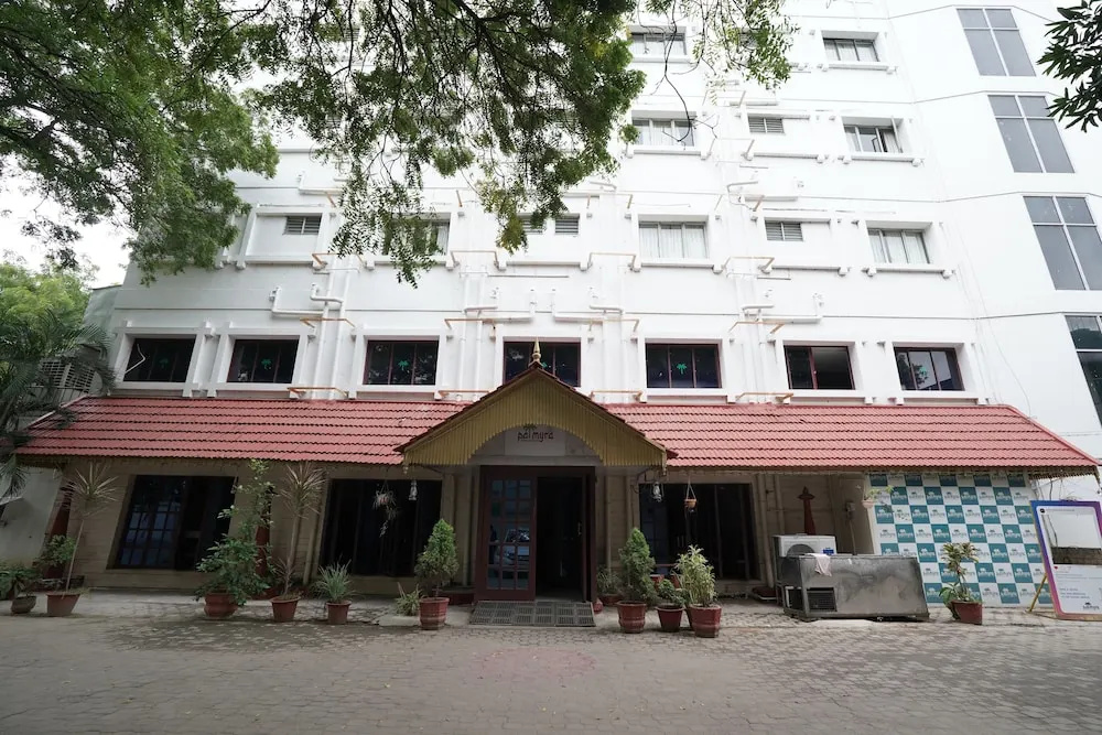 Hotel Palmyra Grand Inn - Chambres