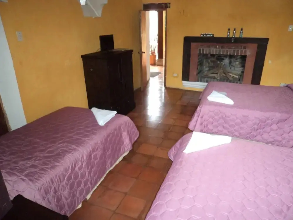 Chez Juanca Hotel Cafe - Chambres