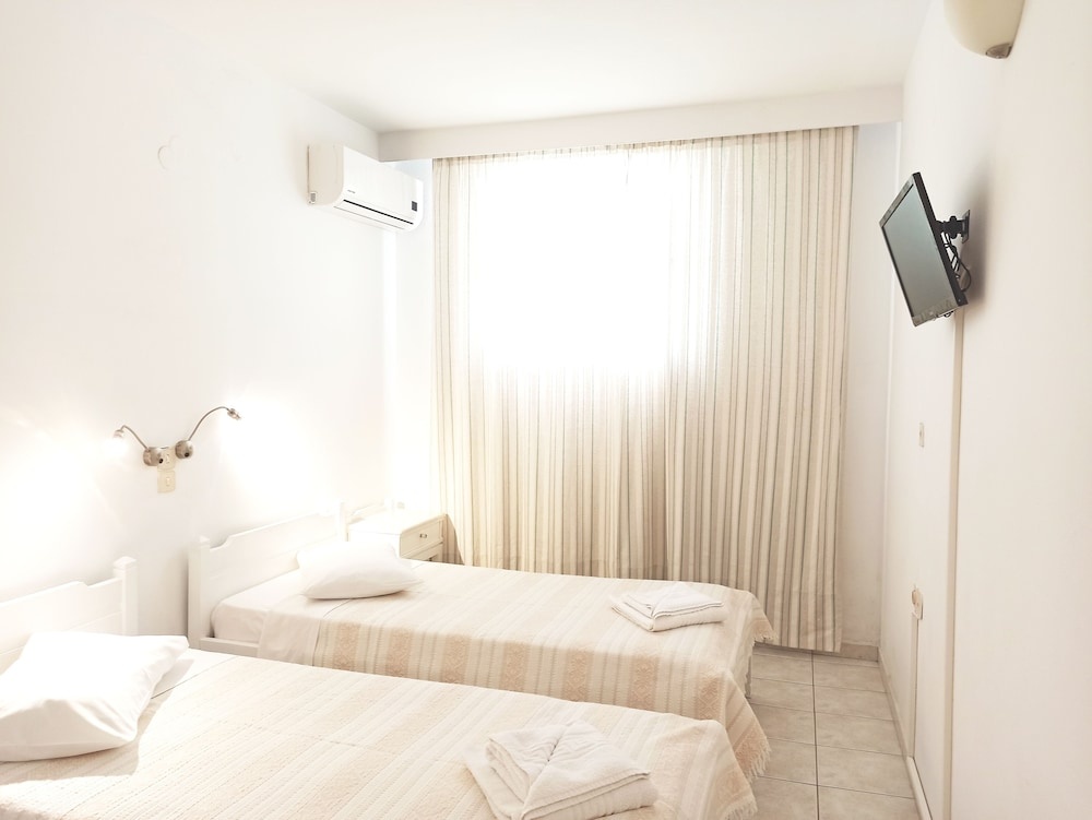 Polos Hotel - Chambres