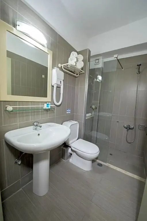 Astron Hotel - Chambres