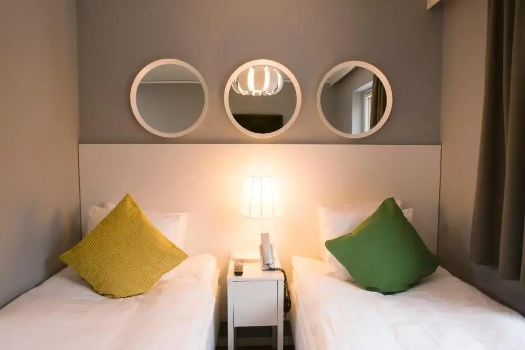 Welcome Hotel - Chambres