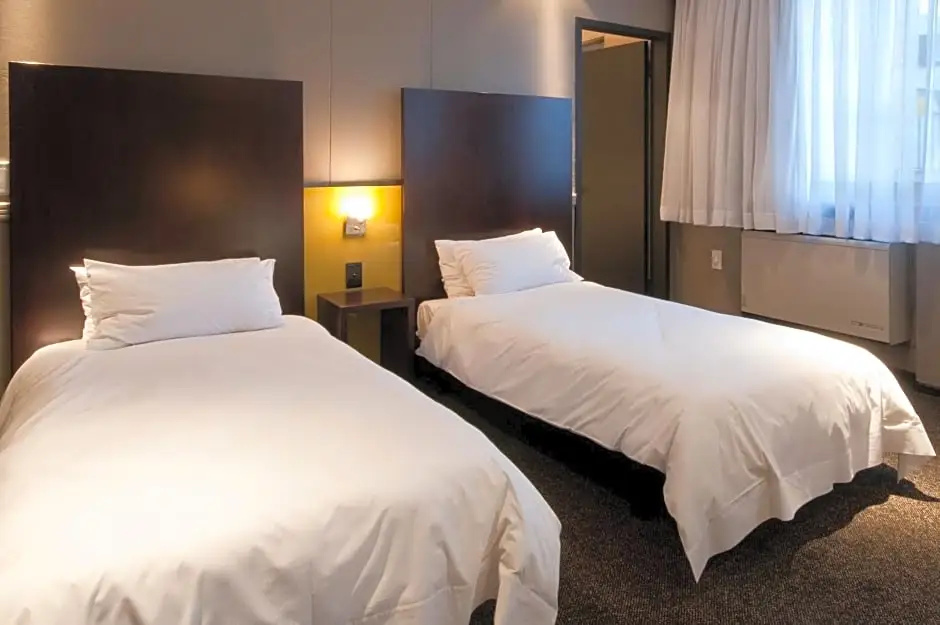 Manhattan Hotel - Chambres
