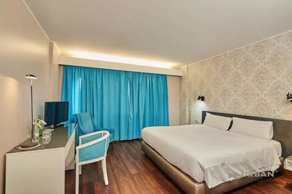 Urban Hotel Amadeos - Chambres