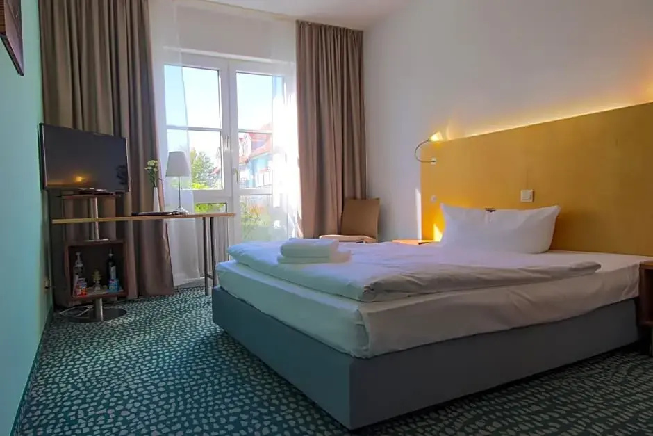 Check Inn Hotel - Chambres