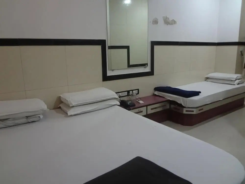 Hotel Swapna International - Chambres
