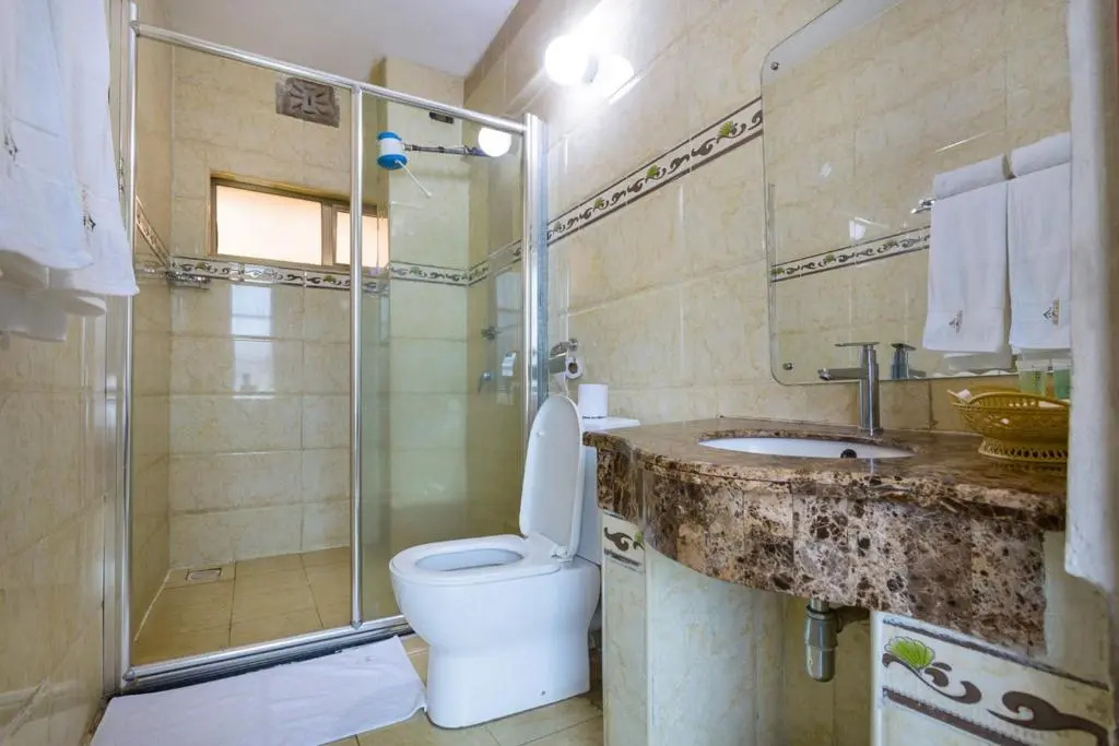 The Legacy Hotel & Suites - Chambres