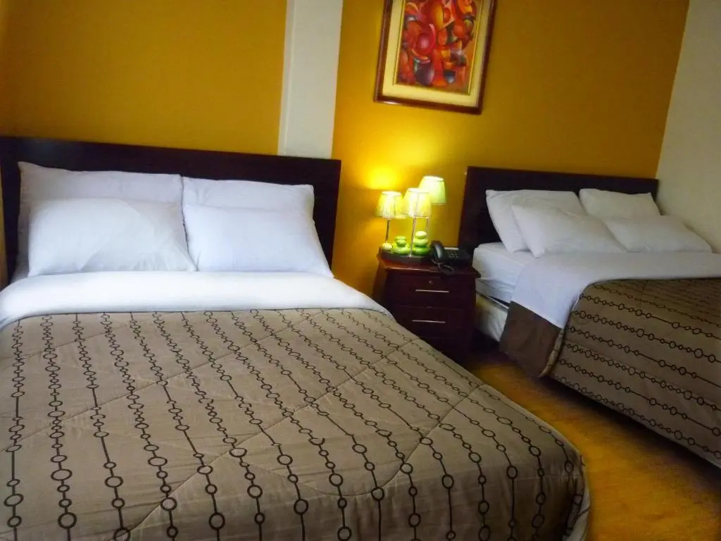 Standard Quadruple room (2 full double beds)