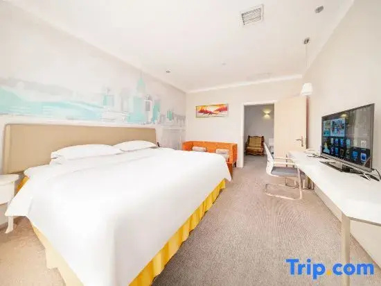 Tian Long Hotel - Chambres