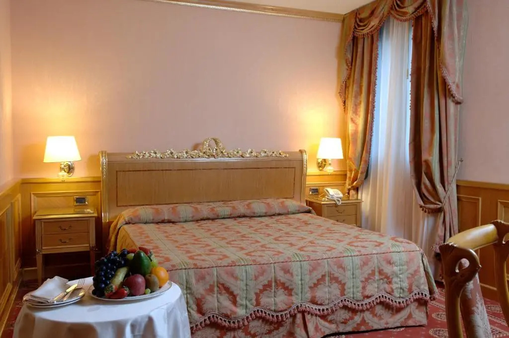 Andreola Central Hotel - Chambres
