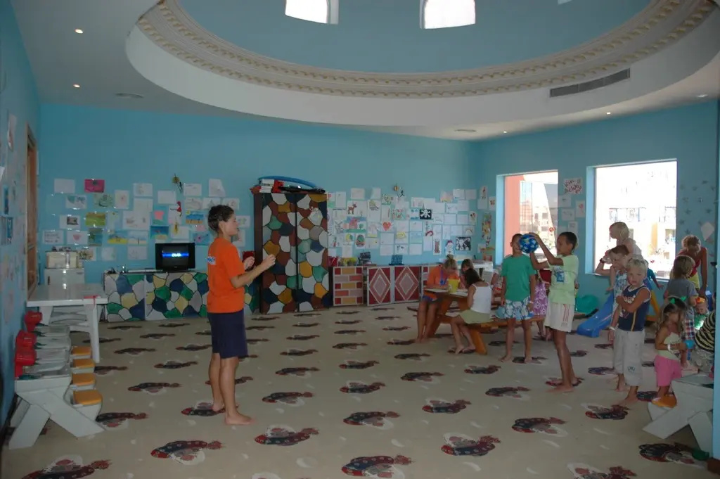 Titanic Beach - Families and Couples only: Children gather for supervised activities in a bright, colorful kids’ club room.