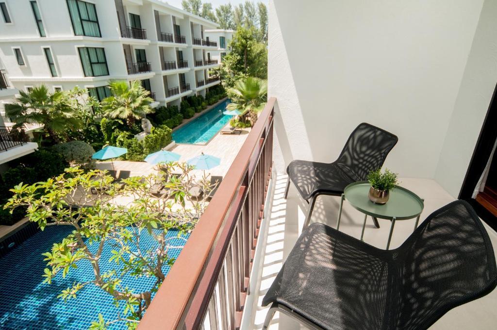 Люкс c 1 комнатой с видом на бассейн в The Title KR Beach Condotel Rawai Phuket