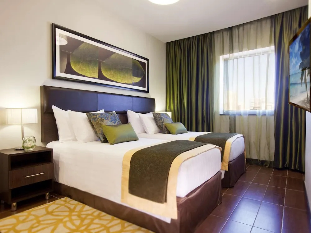 Movenpick Hotel Apartments Al Mamzar Dubai - Chambres