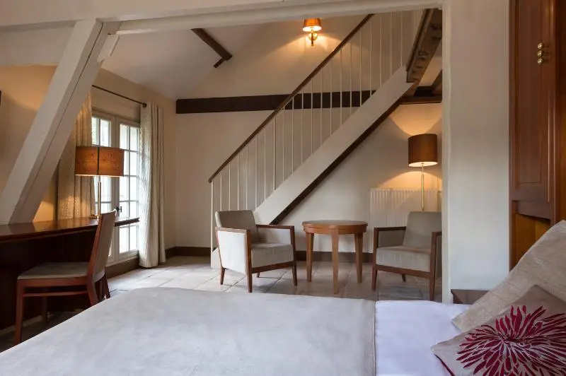 Hôtel Aux Vieux Remparts - Chambres