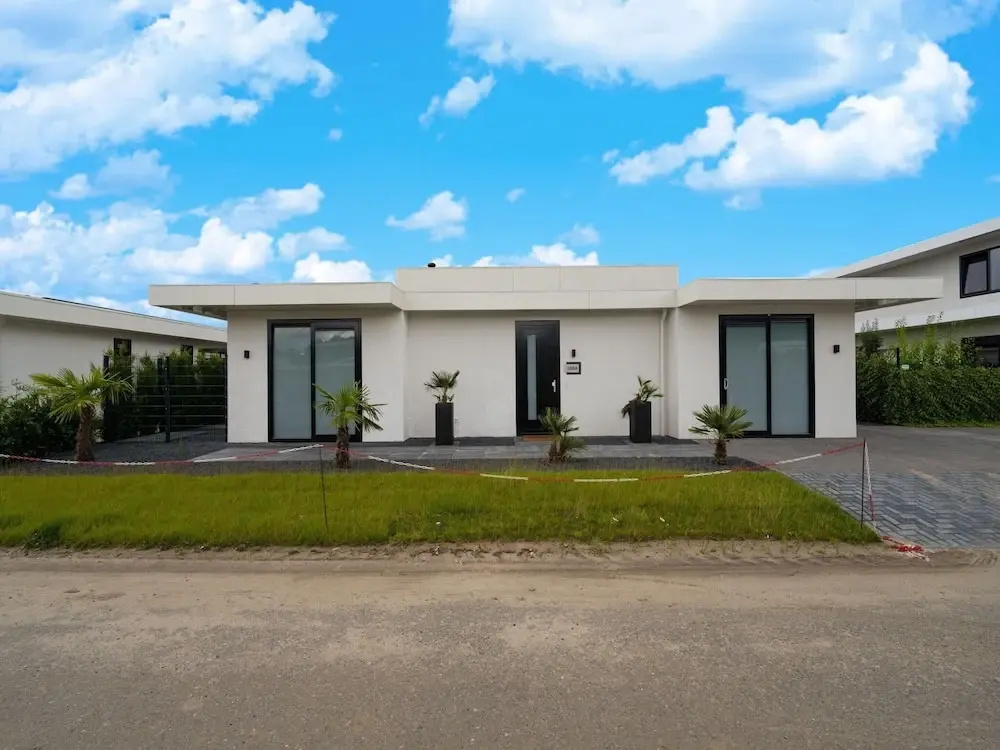 Villa With Covered Terrace and Jetty on the Water