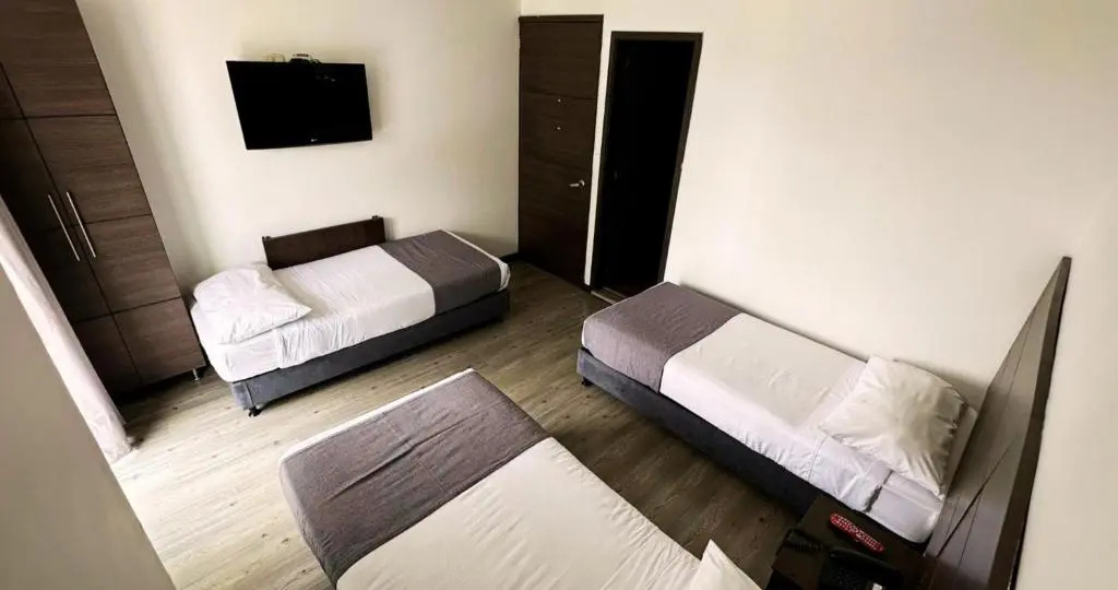 Expo Hotel Ferial - Chambres
