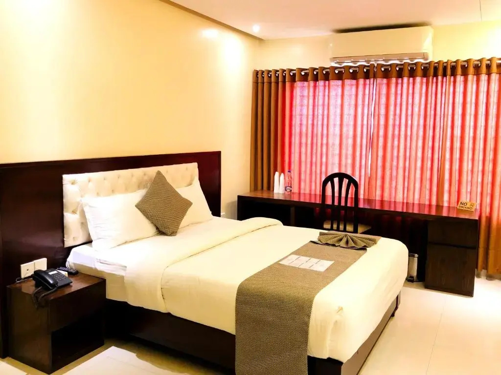Richmond Hotel & Apartments - Chambres