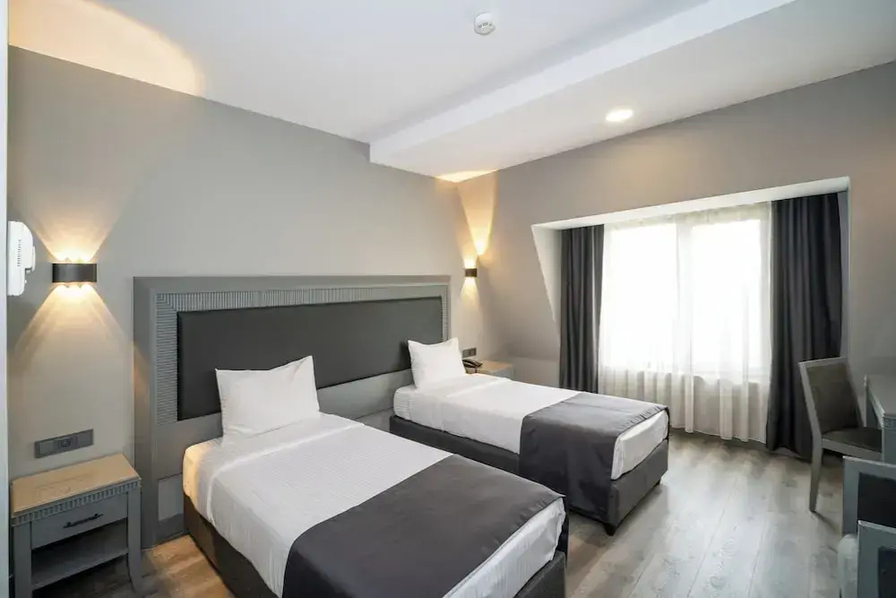 Grand S Hotel - Chambres