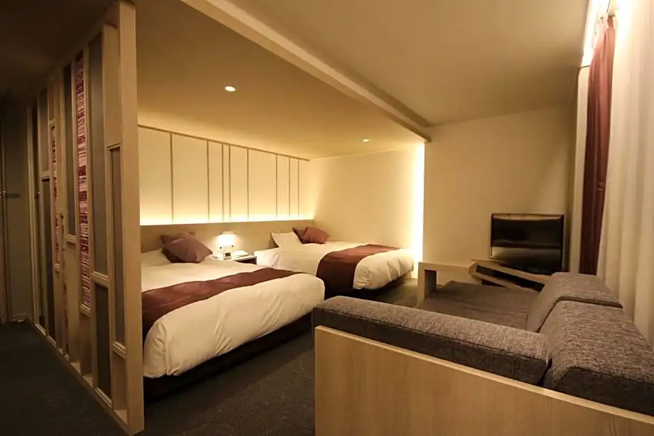 Kita Hotel - Chambres