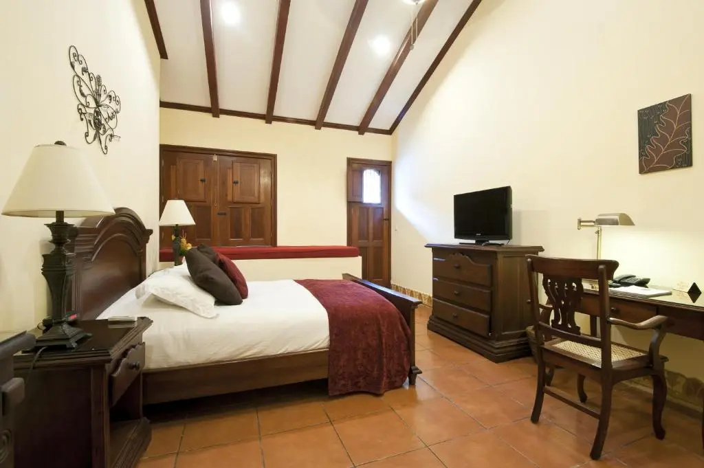 Hotel Plaza Colon - Chambres